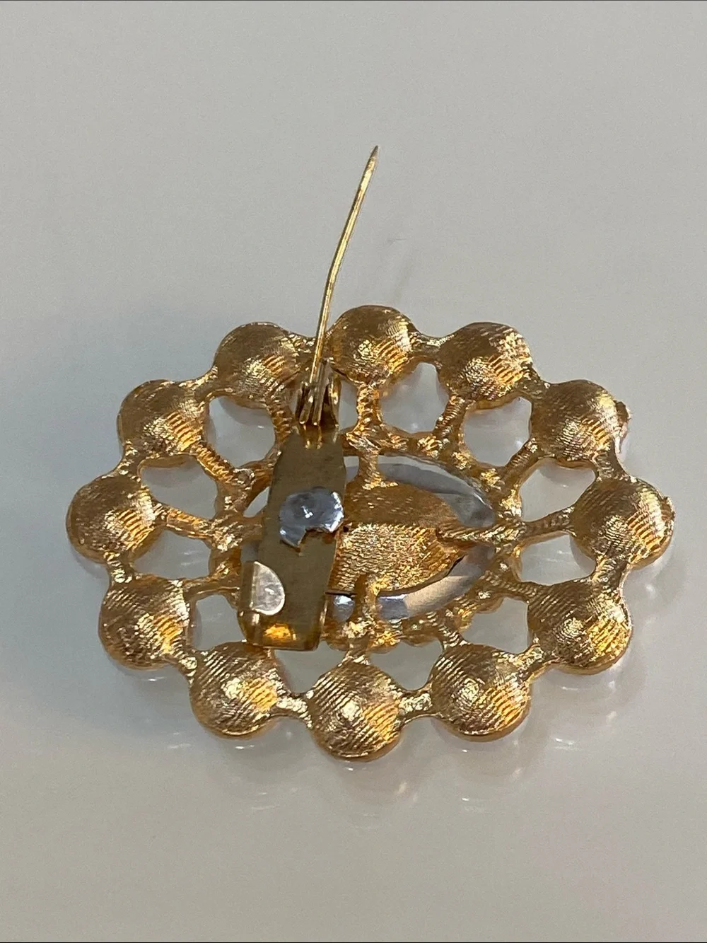 Faux pearl brooch